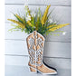 Cowgirl Boot Wall decor with artificial flowers.